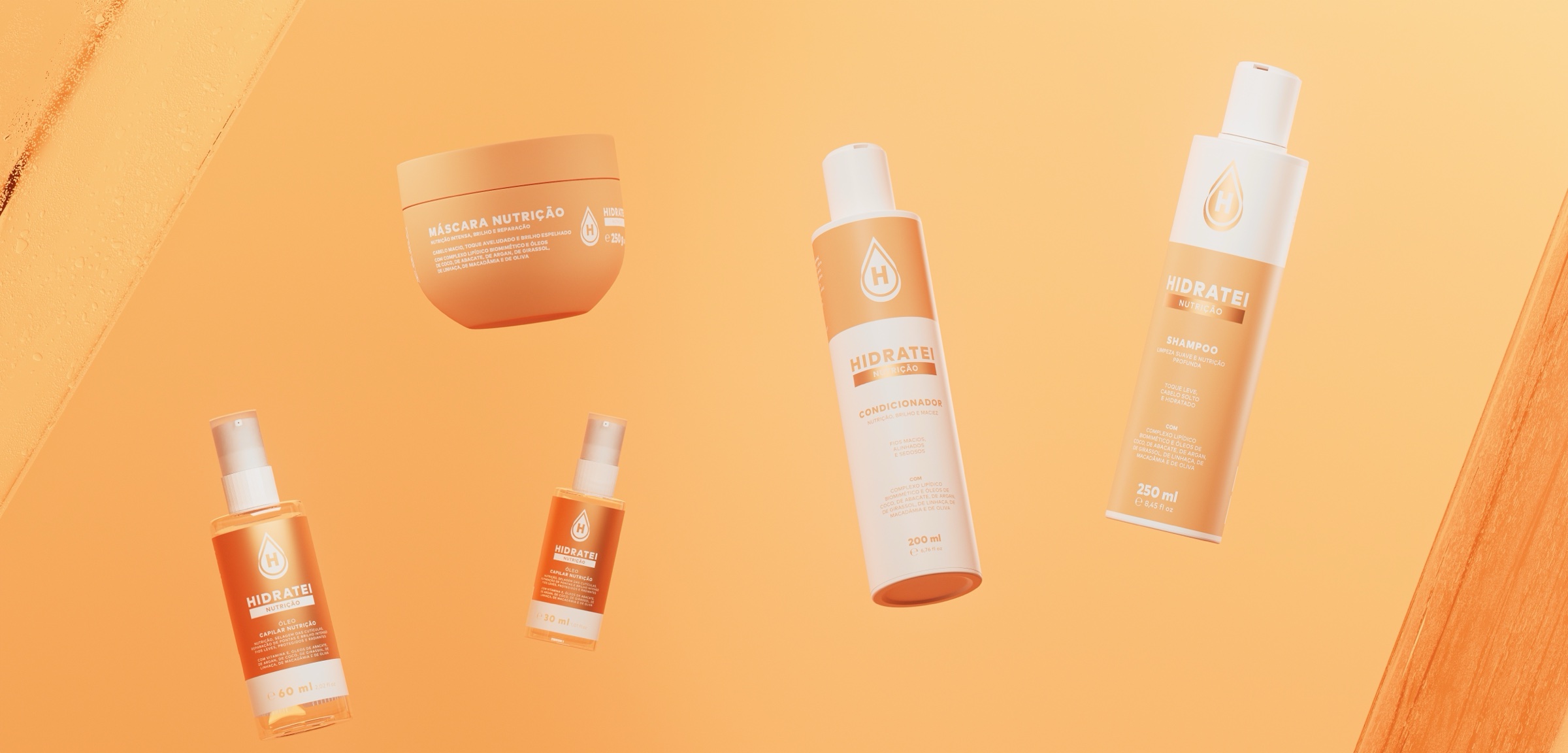 Máscara, shampoo, condicionador e óleo capilar em dois tamanhos da Linha Nutrição da Hidratei sobre fundo laranja